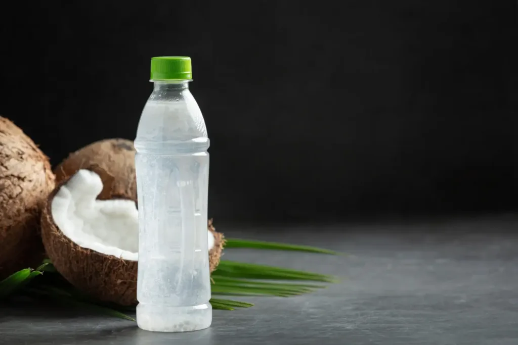 Eco-friendly plant-based plastic bottle made from renewable materials like sugarcane and corn, symbolizing sustainable alternatives to petroleum-based plastics.